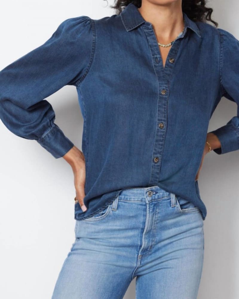 Front of a model wearing a size XL Angelica’S Denim Button Down in Blue in Blue by Rails. | dia_product_style_image_id:346440